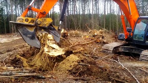 take tree down with mini excavator|mini tree removal.